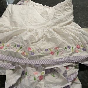 Gently used pottery barn kids garden party crib skirt.